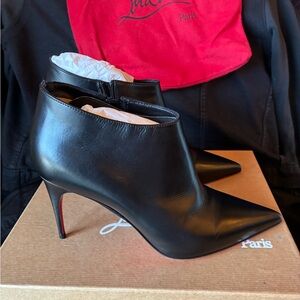 Christian Louboutin Black Leather Pointed Toe Ankle Booties with Red Sole